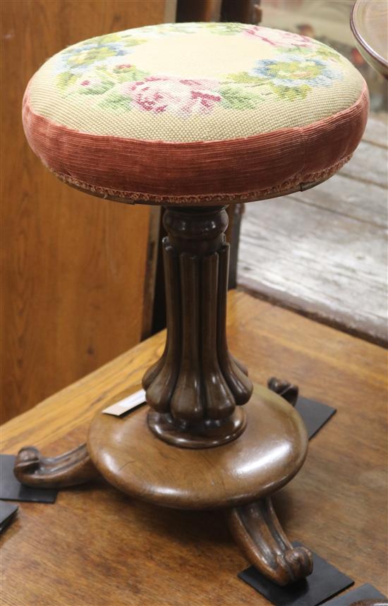 Two Victorian circular adjustable piano stools